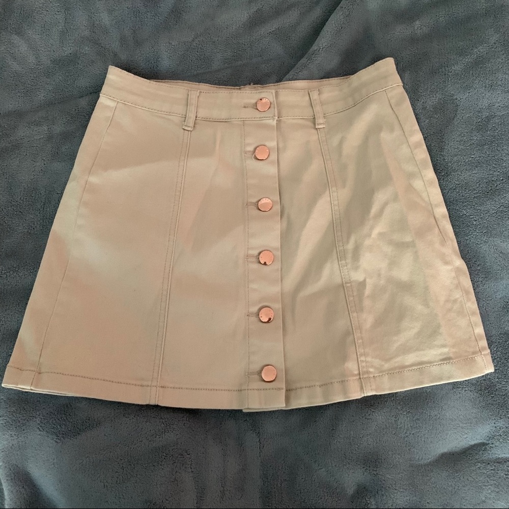 Beige button up front mini skirt